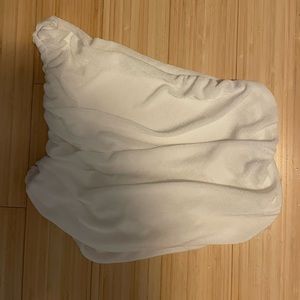 One shoulder white top